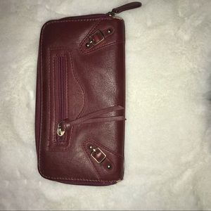 Maroon zip shut wallet